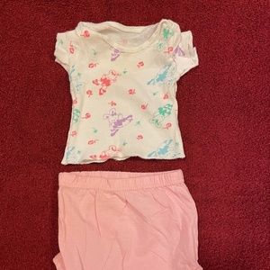 Infant t-shirt and bottom set. White tee with design. Solid pink bottoms. 6-9M